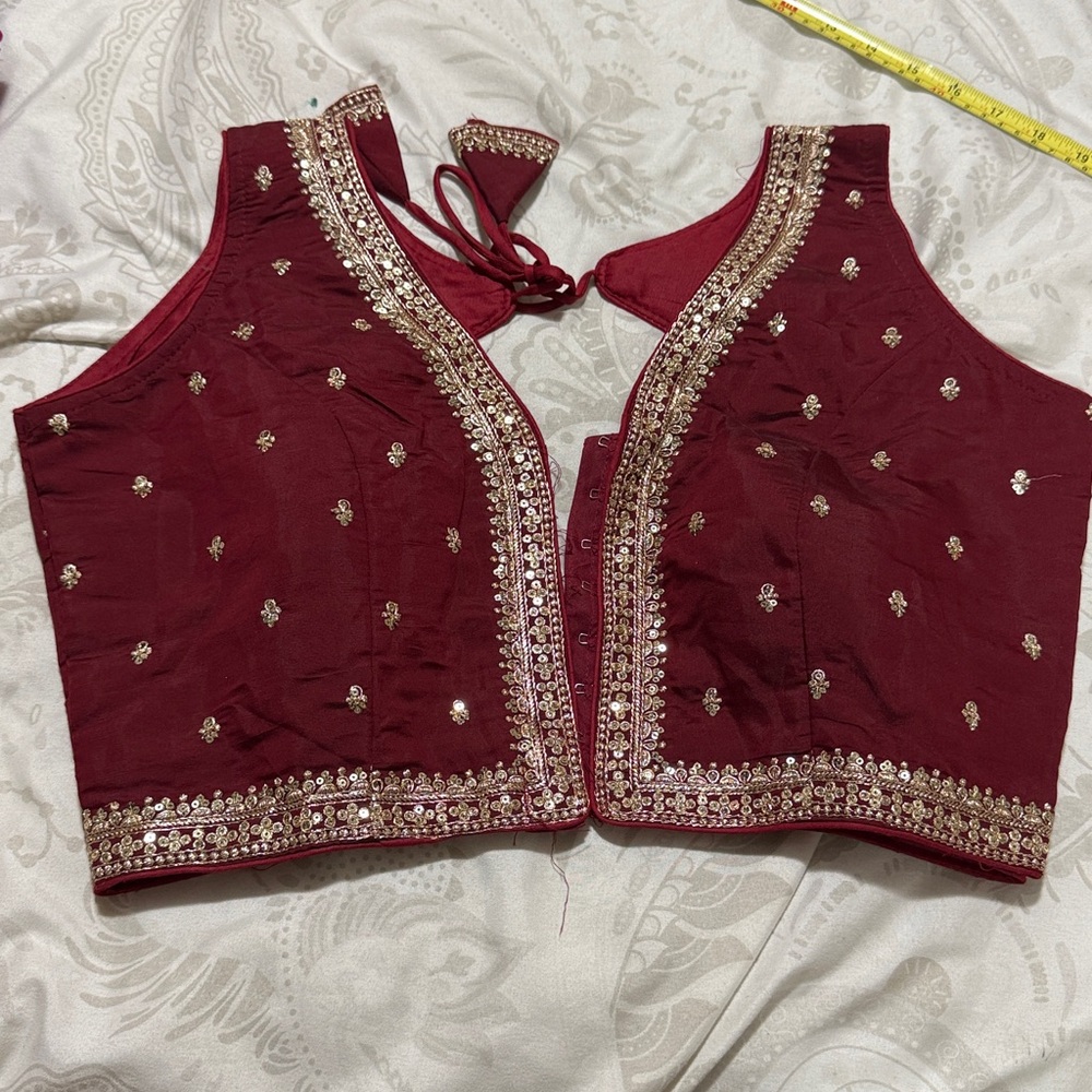 Embellished Maroon Sleeveless Blouse